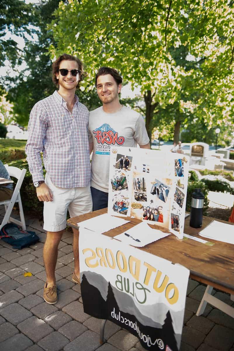Outdoors club members pose for a photo as student organizations and clubs hosted tables at the Involvement Expo.